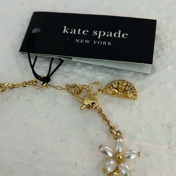 Kate Spade Gold Charm Bracelet with Whimsical Details - Picture 7 of 7